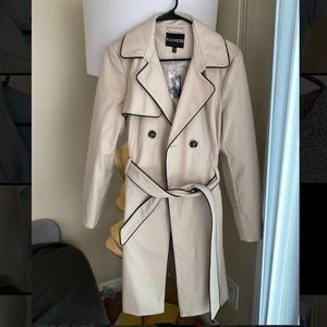 Trench coat with piping.